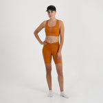 SHORT RUNNING TITÁN 2.0 CARROT PARA MUJER